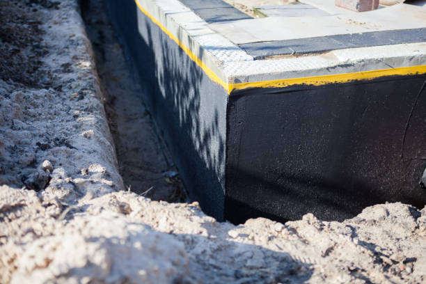 Professional Waterproofing technician working in Rensselaer, IN